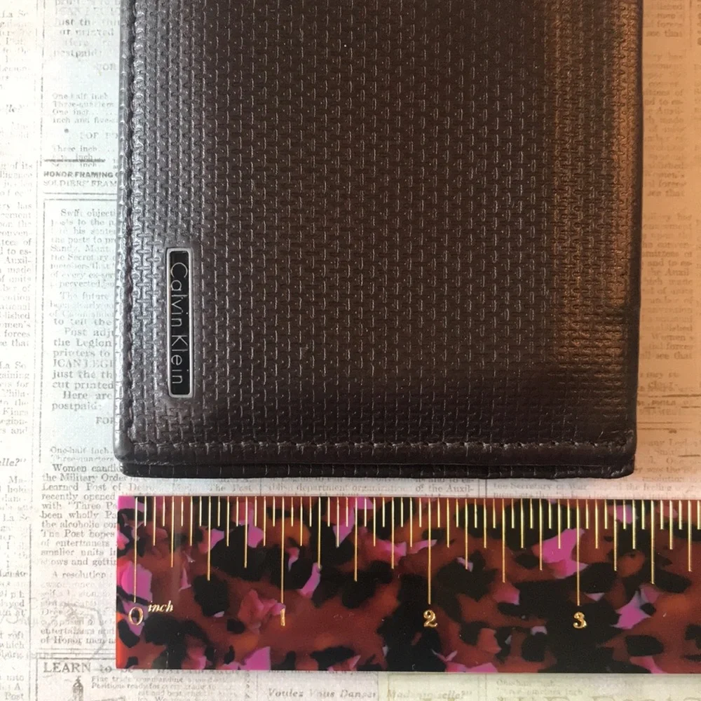 Calvin Klein Textured Leather Bi-Fold Wallet